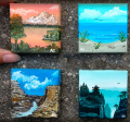 four painted tiny canvases of landscapes