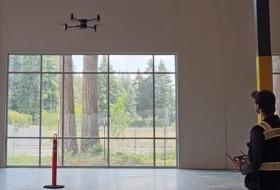 Building staff flying drone