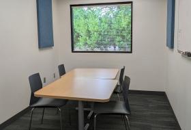 study room with table and chairs