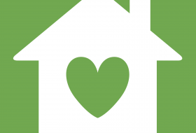 Green heart inside of white house on green background