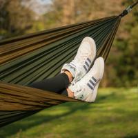 teen lounging in hammock