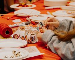 Craft table at Lunar New Year Event with themed stickers 