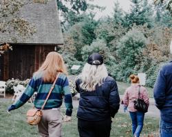 friends walking to the barn