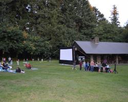 people sitting in front of movie screen