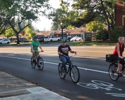 Intern at the caboose of a bike ride