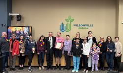 The mayor with residents celebrating declaration of June as Pride Month