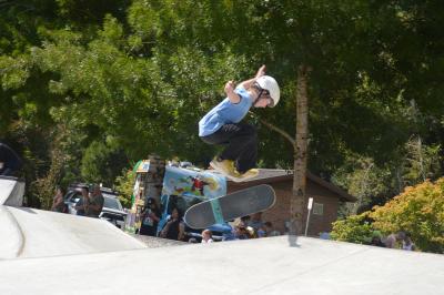 Skateboarder in mid-air at Skate Jam