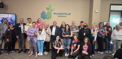 Wilsonville Pride members, allies, and City Councilors celebrating Pride Month proclamation