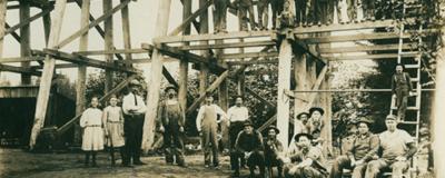 People and the trestle bridge. [1906-1907]