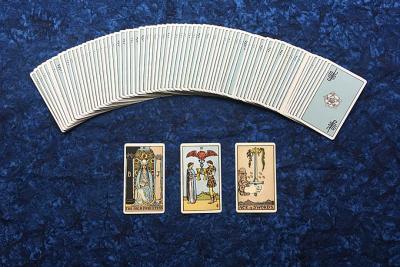 tarot cards laid out on blue velvet