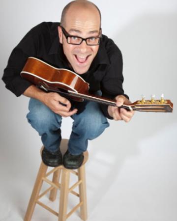 photo of Rick Huddle with guitar