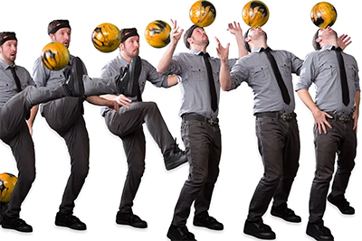 photo of Matt Baker tossing a bowling ball with his foot and catching it on his forehead