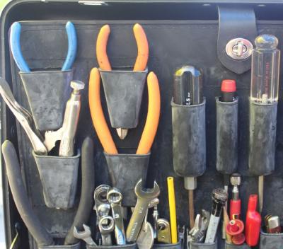 assortment of pliers, screwdrivers, and wrenches