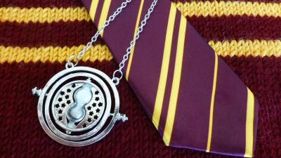 Gryffindor sweater, tie, and time turner