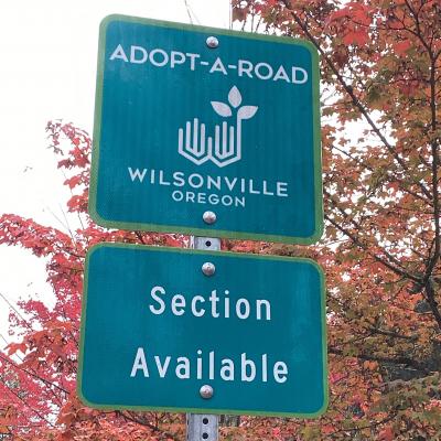Adopt A Road sign