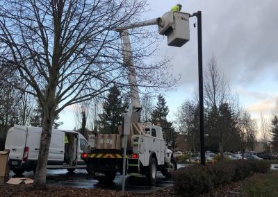 Crews install new LED fixture