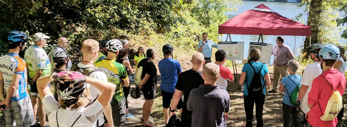 Crowd attends public meeting at Boones Ferry Park near the Willamette River.