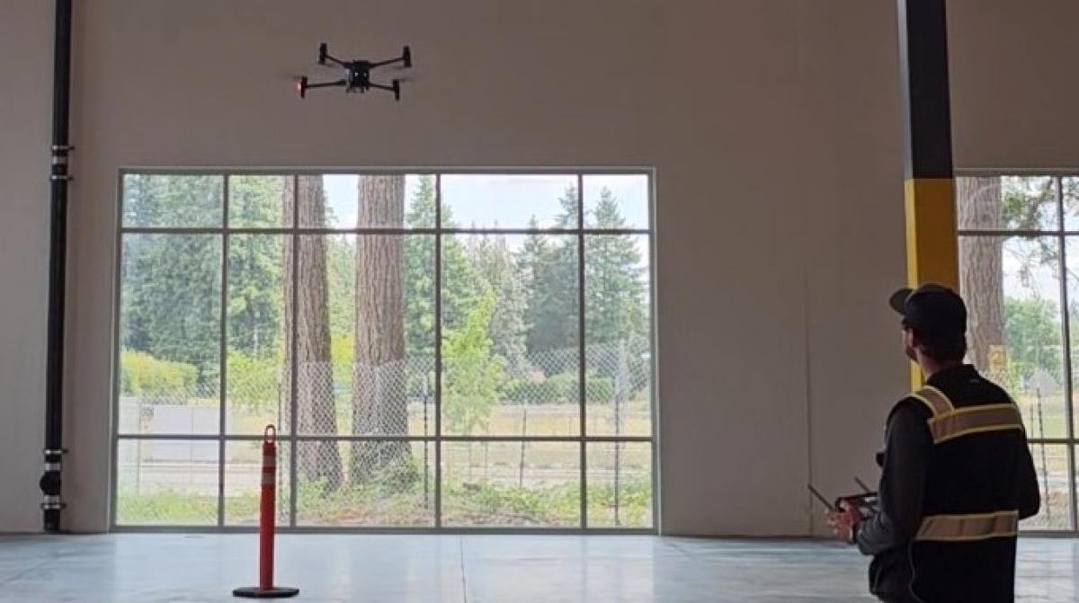 Building staff flying drone