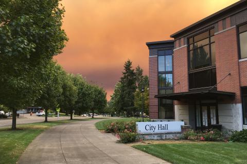 City Hall with orange skies from nearby wildfires