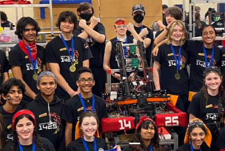 photo of Wilsonville HS Robotics Team with robot