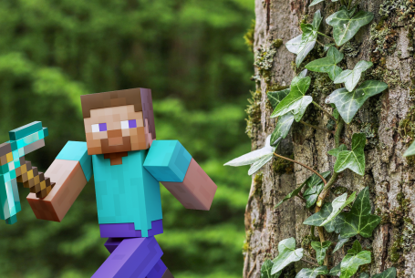Minecraft Steve in forest next to tall tree covered in ivy