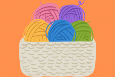 woven basket with balls of colored yarn