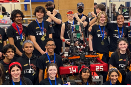 Wilsonville HS robotics team with robot