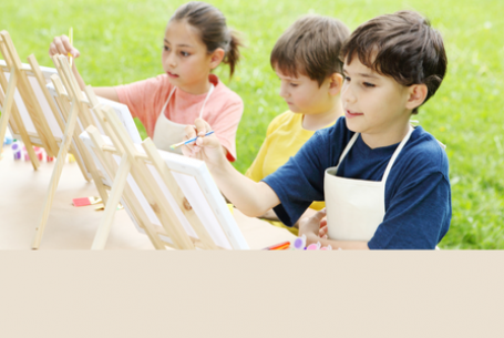 children outdoors painting