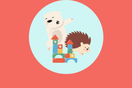 Young polar bear and hedgehog are behind a multicolored block tower. Polar bear is dabbing.