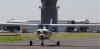 Aurora Airport small jet taking off on runway