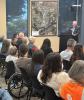 Shawn O'Neil at podium delivering address as residents listen