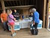 People gathered at an information table