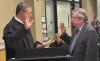 Sam Scull gets sworn in by Judge Fred Weinhouse