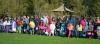 Kids lined up on  the grass before egg hunt begins
