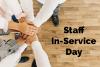 staff stacking hands on top of each other
