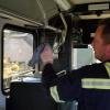 SMART staff disinfecting , wiping down a handle